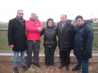 I genitori di Maria Paola Rauso con allenatori e presidente del Clan