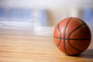 Closeup of Basketball on the Court Floor