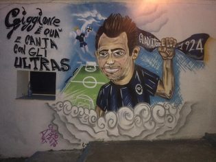 Il murales che ritrae "Giggione"